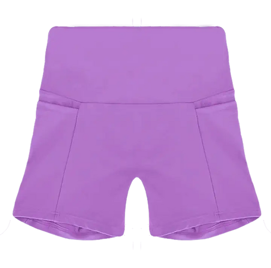 A flat lay image of the Allawah Shorts in the colour Lavender, showcasing side pockets and a seamless front